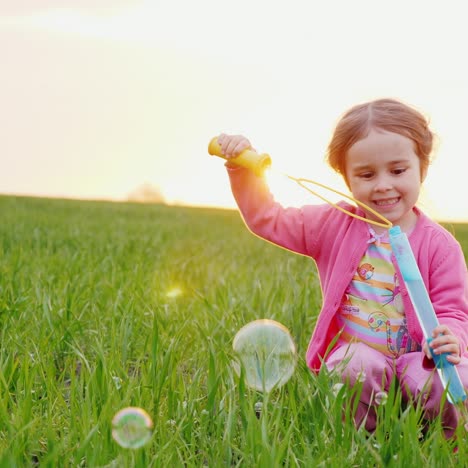 A-Little-Girl-In-A-Pink-Blouse-Fetches-Bubbles