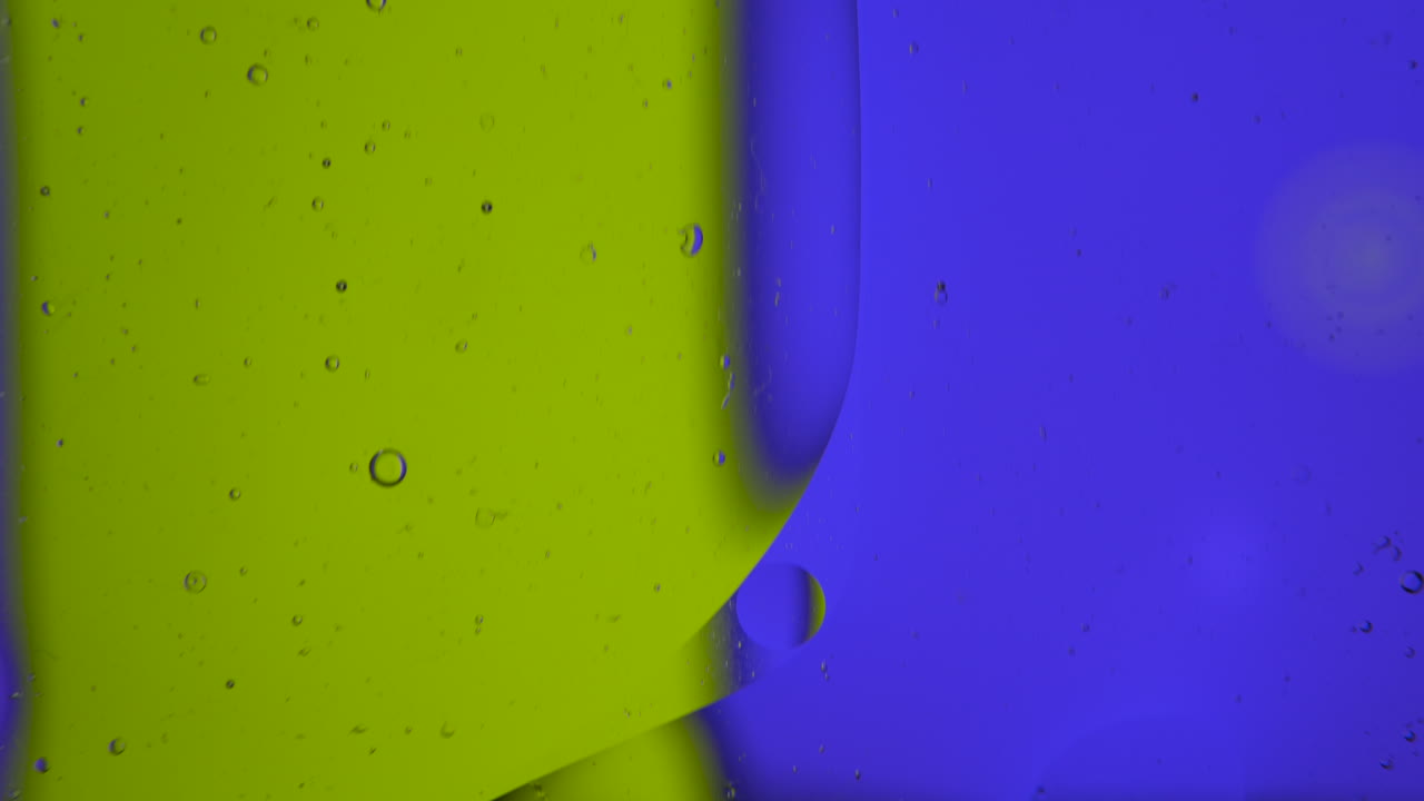 Abstract: rotating colorful display of changing colors flowing down, background