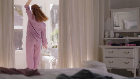 beautiful-young-woman-practicing-ballet-dancing-in-bedroom-rehearsing-dance-on-weekend-morning-wearing-pajamas