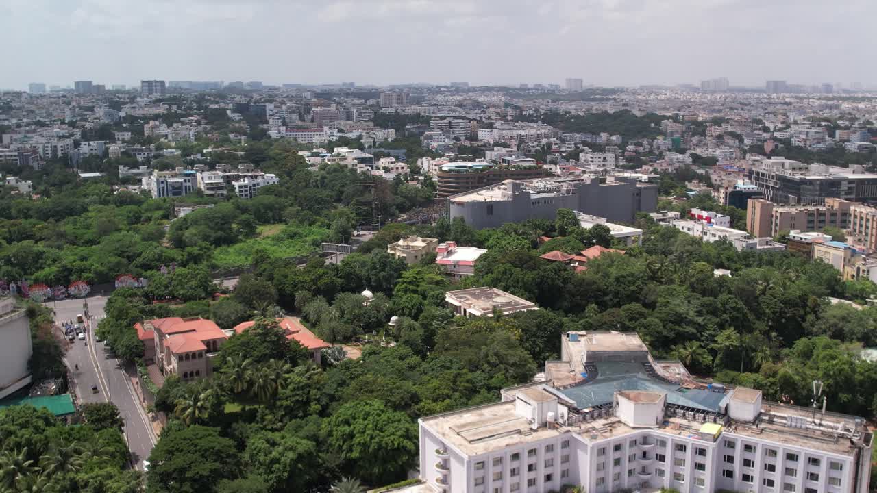 Daytime in 4K Aerial footage of Hill Top Colony, Banjara Hills, and Khairtabad, India's urban residential and commercial centres in Hyderabad, Telangana