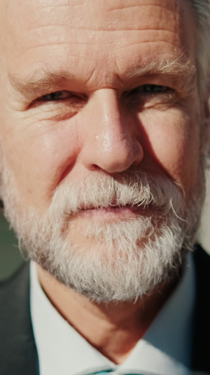 Confident Senior Businessman in Front of Office Building