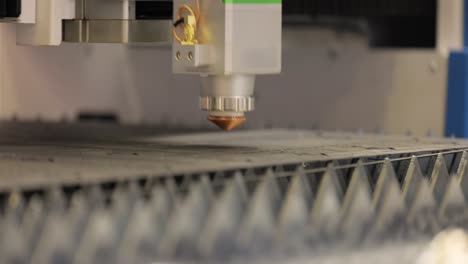 CNC-Laser-cutting-of-metal,-modern-industrial-technology.