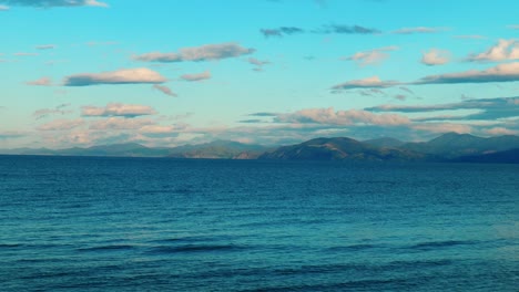 South-Island-spectacle:-Clouds-gracefully-roll-over-hills-in-mesmerising-stock-footage