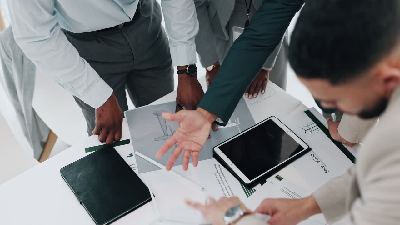Business people, wind turbine model