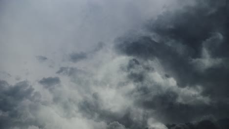 4k thunderstorm, cumulonimbus clouds in the sky moving with lightning strike