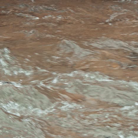 white mountain stream water falling down