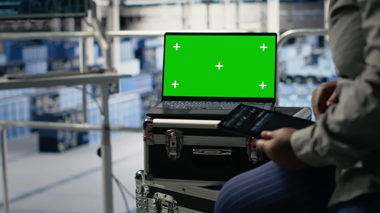 Close Up Of Data Center Employees Check Ai Dashboard Using Green Screen Tablet
