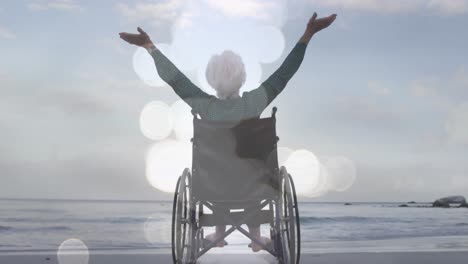 animation of light spots over disabled caucasian woman with arms outstretched