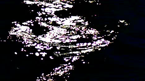 special water ripple effect, sun lighting impacts in black with slow motion