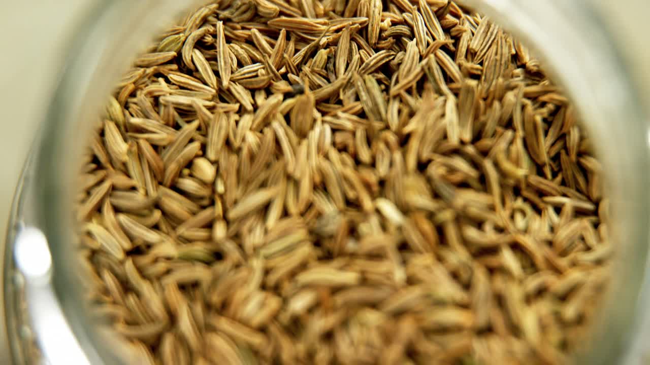 Cumin in jar 4k