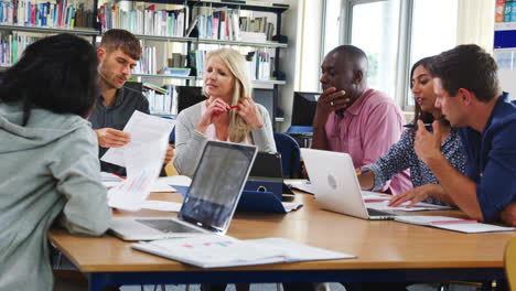 group of mature college students collaborating on project