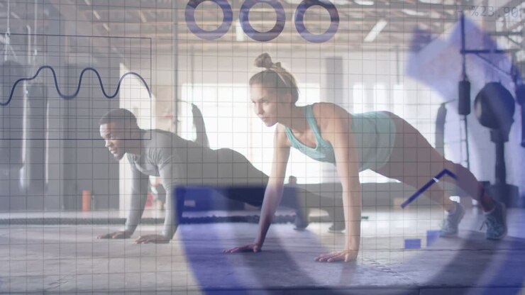 Woman leading, man trailing doing push-ups in gym, reps starting charts collecting analysing data