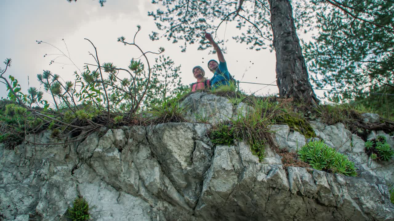Walking along a ridge to the top of the hill. Hiking through beautiful nature. Slovenia
