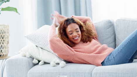 Woman-checking-her-phone-before-lying-down