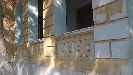 sunlit facade of goolbai maternity home, karachi