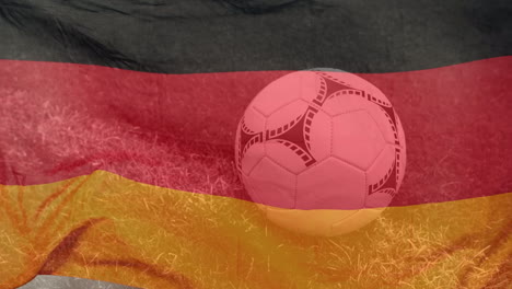 animation of flag of germany and football over stadium