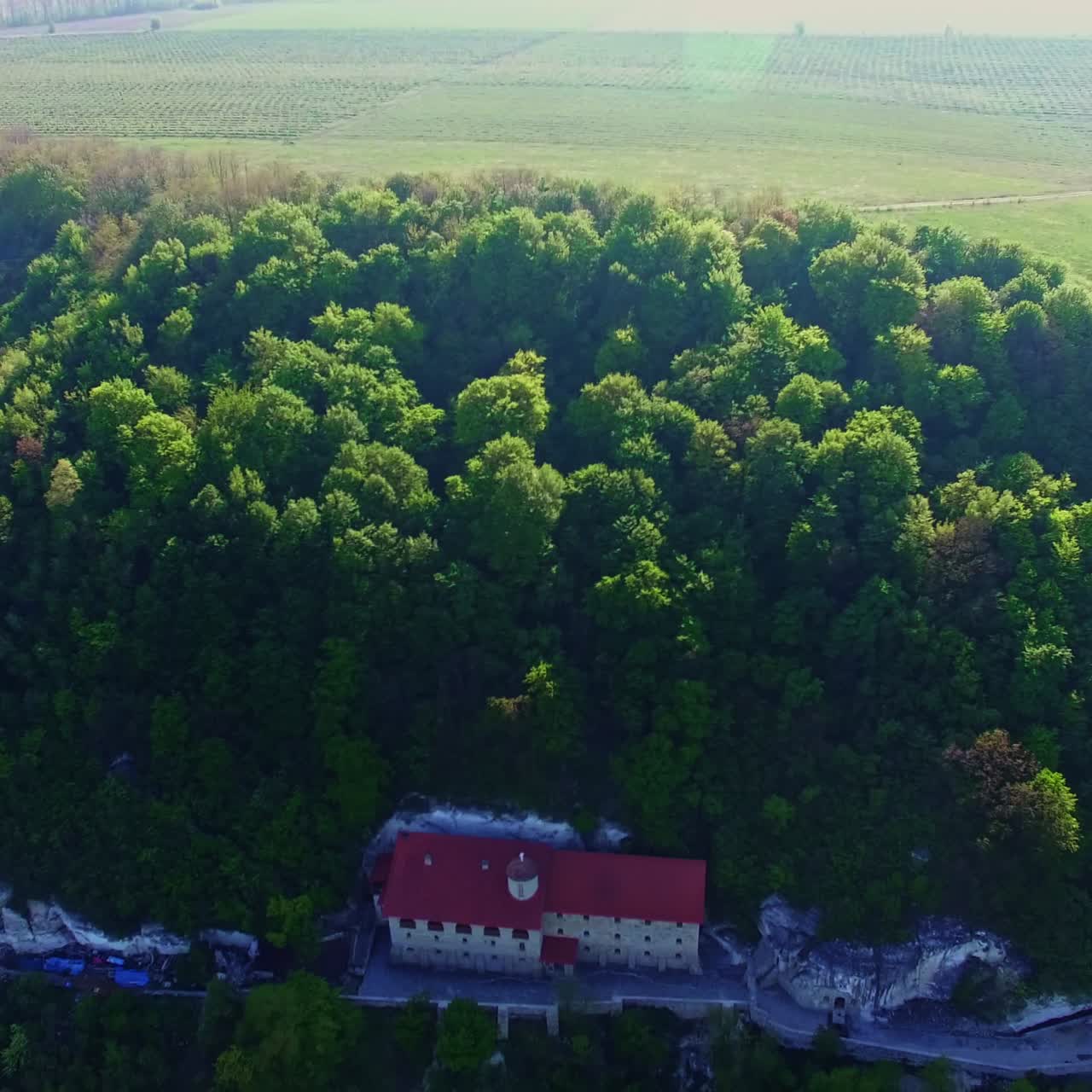 Liadova Rock monastery in Ukraine. Amazing view of the mount with a church in the middle. Aerial perspective