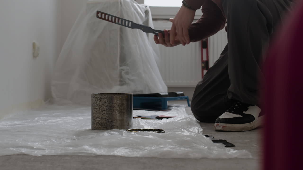 Man Painting a Room - Home Improvement DIY Project