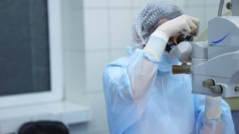 ophthalmology laser microscope operation. ophthalmologist surgical microscope in operating room