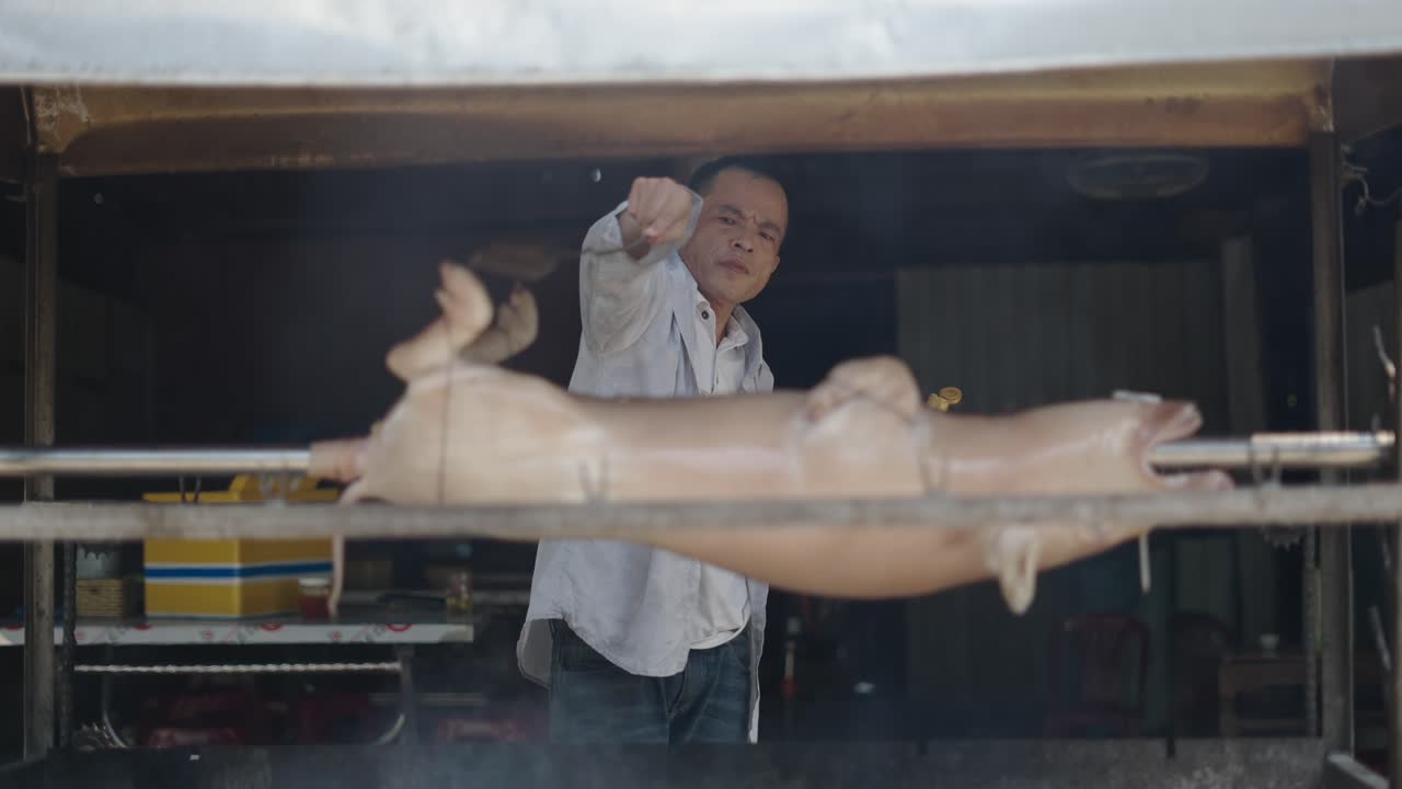 Street Vendor Roasting a Pig