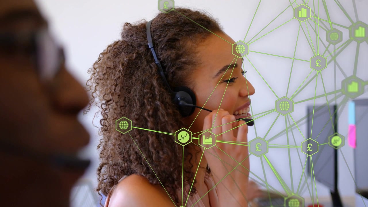 Vertical video: Call center agent adjusting mic and activating green net overlay, speaking, typing