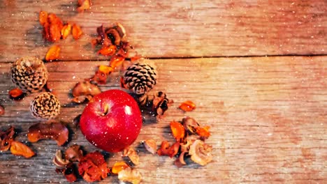 christmas decoration on wood combined with falling snow