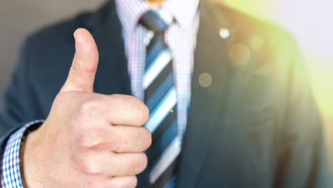 businessman showing thumbs up. parallax closeup 4k video