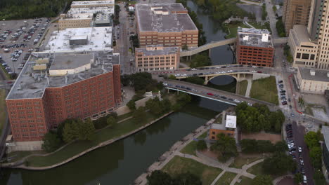 drone shot of the buffalo bayou that runs through downtown houston, texas