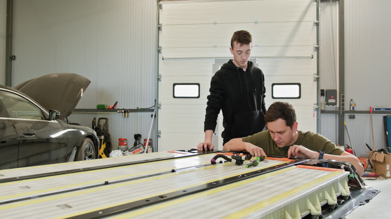 Electric Vehicle Battery Maintenance and Repair in a Garage