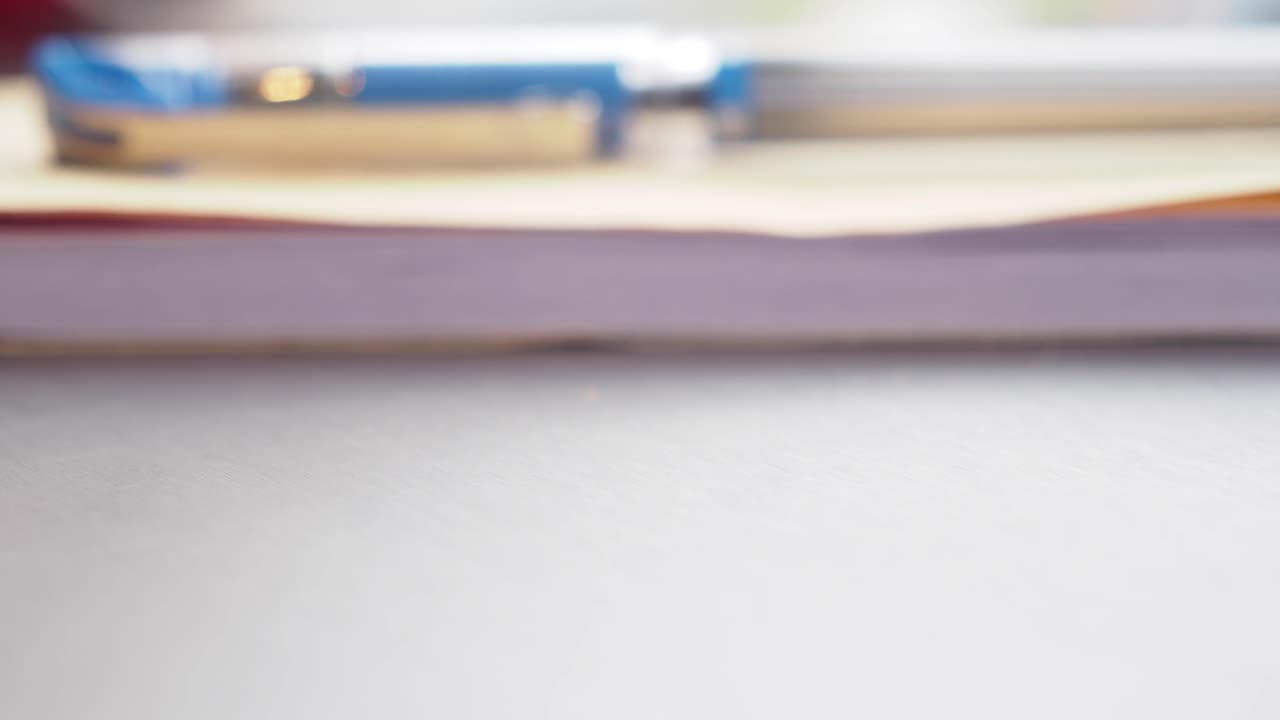 Car Key on a Desk with Documents