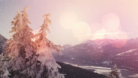 spots of light and snow falling over winter landscape with mountains and trees