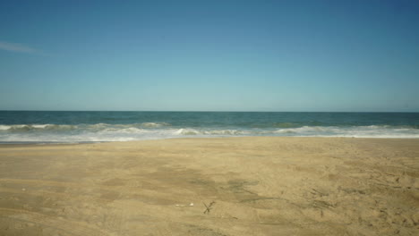 panning time-lapse shot of the atlantic ocean and beach in delaware, usa