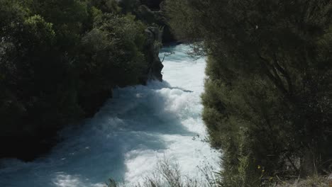 Huka-falls-waterfall-wild-river-on-a-sunny-day-in-Taupo,-New-Zealand