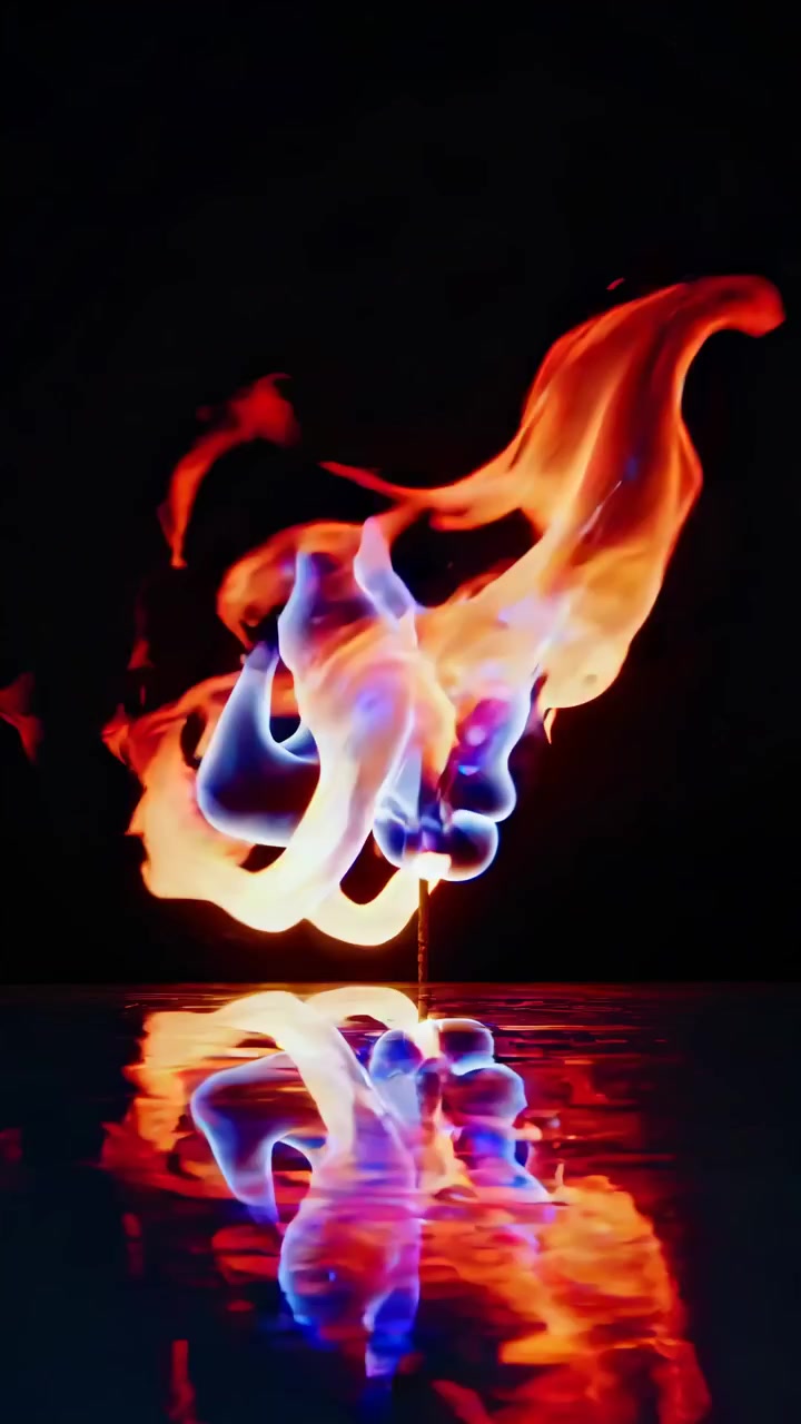 Farverige abstrakte flammer danser på en reflekterende overflade