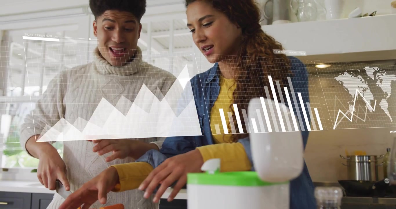 Man chopping carrots while woman tapping smart kitchen appliance watching overlay guiding meal prep