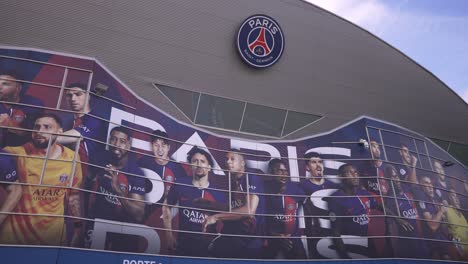 paris saint-germain stadium facade with team players mural