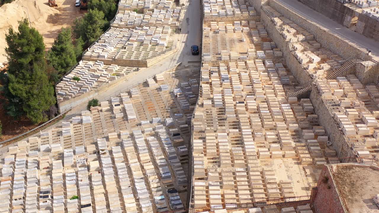 Aerial View of a Vast Cemetery with Numerous Graves