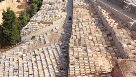 aerial view of a vast cemetery with numerous graves