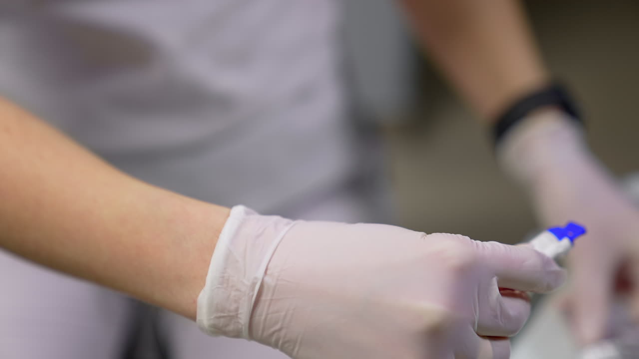 Woman dentist in dental office. Doctor holding instrument tool for oral examination