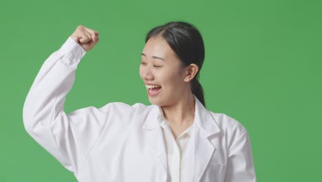 confident woman scientist celebrating