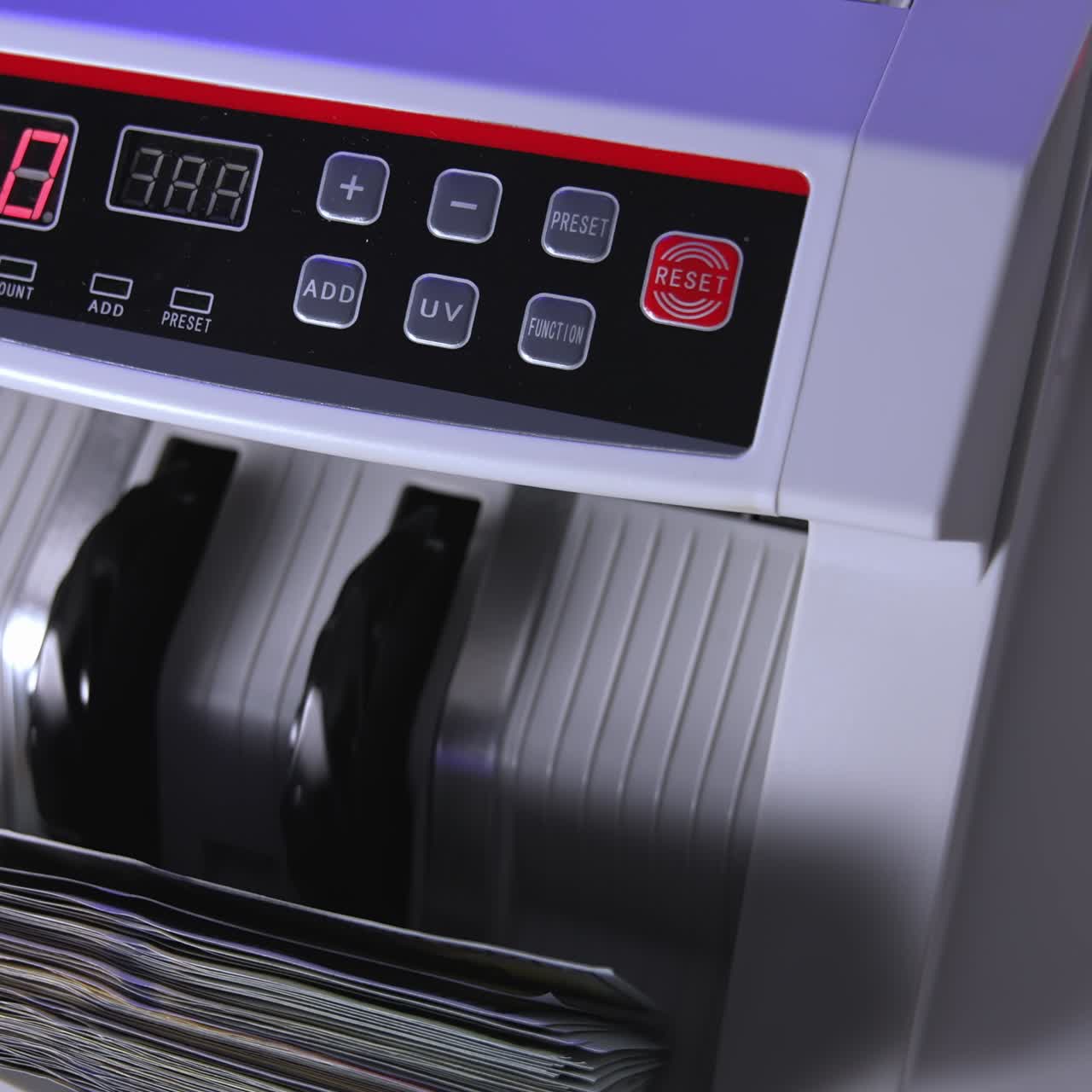 Dollar counting equipment in bank. Money banking counter. Money and economics concept. Cropped view