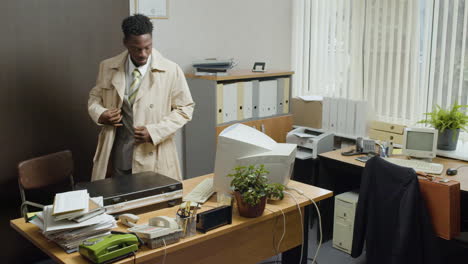 African-american-businessman-entering-the-vintage-office.