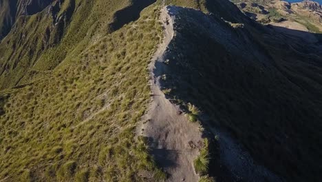 directly above a mountain ridgeline in new zealand