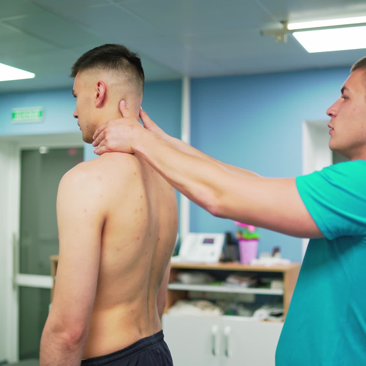 Physiotherapy worker with client