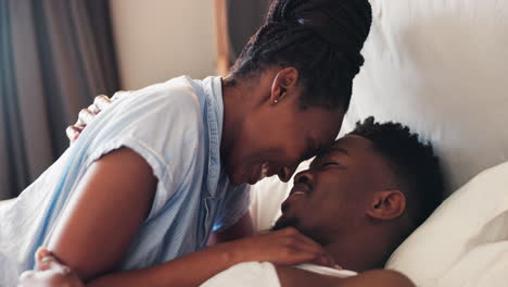 Bed,-faces-and-African-couple-in-bedroom-together