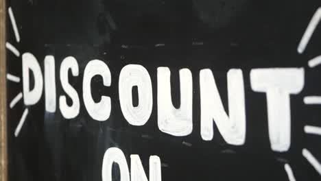 discount sign on blackboard