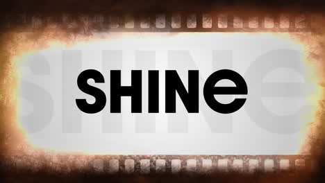 digital animation of film reel effect over shine text on grey background