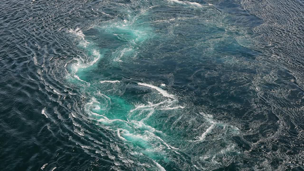 Blue waves of water of the river and the sea meet each other during high tide and low tide