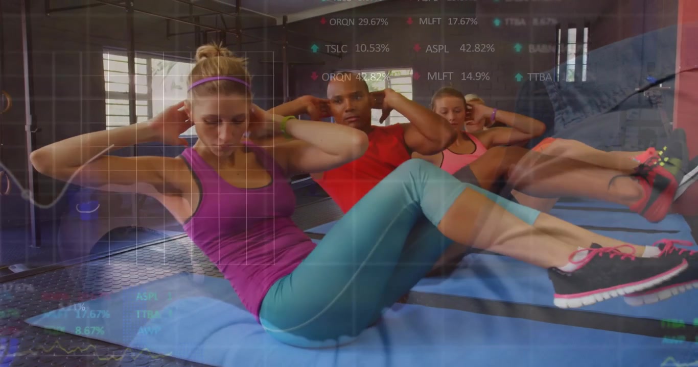 Lead woman cueing group leading health doing bike crunches on blue mats charts tracking core reps
