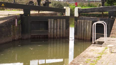 4k view of a canal gate in the bridgewater and taunton canal